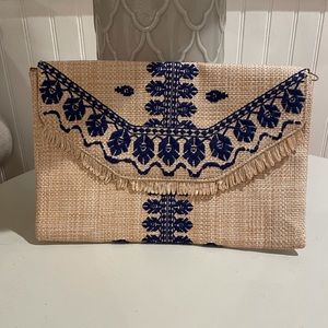 Beautiful straw clutch by Stella & Dot